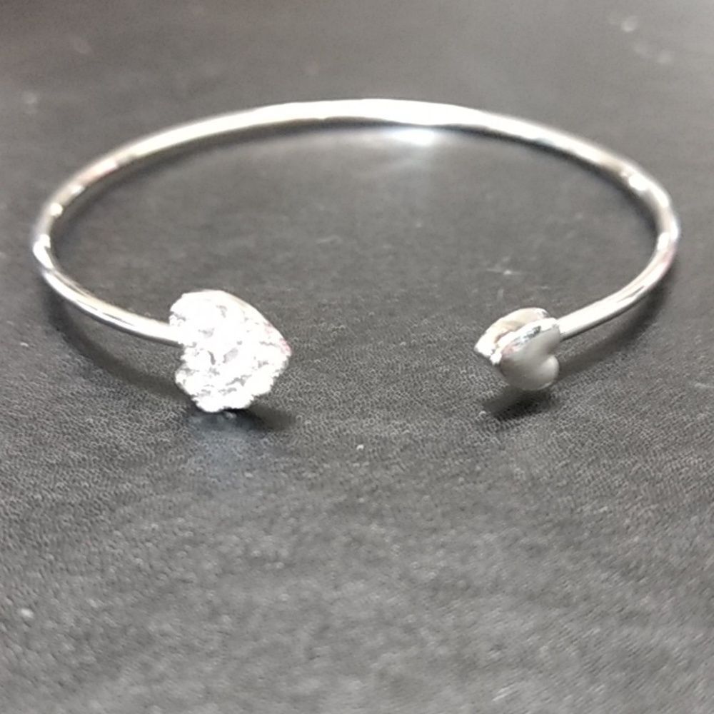 Child's silver tone heart bangle bracelet 7"